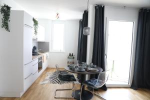 Kuchyňa alebo kuchynka v ubytovaní City-Apartment Die kleine Mü