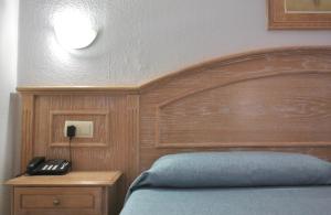 Postel nebo postele na pokoji v ubytování Apartamentos Park Plaza