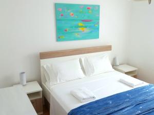 Posteľ alebo postele v izbe v ubytovaní Apartments Magdalena AS1