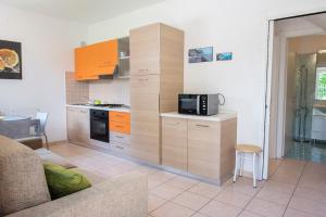 Kuchyň nebo kuchyňský kout v ubytování N011 - Numana, nuovo bilocale con giardino + 10 fotografií