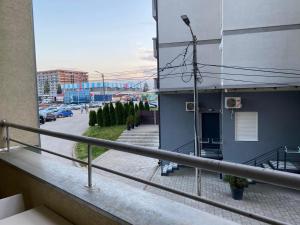 a balcony of a building with a view of a street at Apartman Kasija in Jagodina