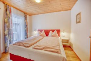 Postel nebo postele na pokoji v ubytování Ferienwohnungen Petschnig 3