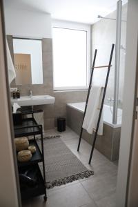 Kúpeľňa v ubytovaní City-Apartment Die kleine Mü