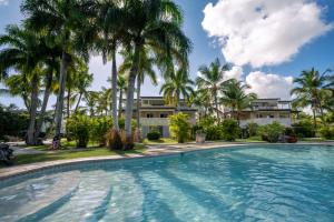 Poolen vid eller i närheten av Family Dominicus Apartment - Bayahibe