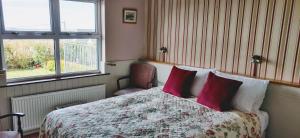 Voodi või voodid majutusasutuse Teac Campbell Guesthouse toas