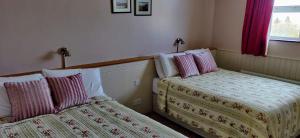 Voodi või voodid majutusasutuse Teac Campbell Guesthouse toas