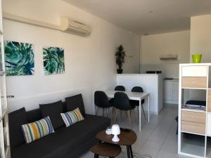 Posedenie v ubytovaní Étoile de la plage Parking privé gratuit