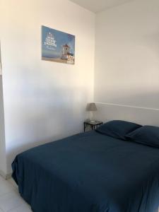 Posteľ alebo postele v izbe v ubytovaní Étoile de la plage Parking privé gratuit