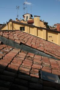 Fotografia z galérie ubytovania Alloggio Incantevole sui tetti di Bologna v destinácii Bologna