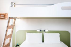 Postel nebo postele na pokoji v ubytování Ibis Budget Montelimar