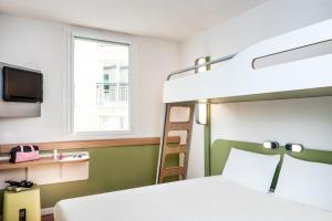 Postel nebo postele na pokoji v ubytování Ibis Budget Montelimar