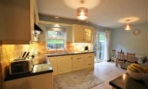 a kitchen with a sink and a counter top at Fermanagh Home in Enniskillen