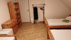 Llit o llits en una habitació de Podkroví v Jihočeském Statku
