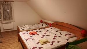 Llit o llits en una habitació de Podkroví v Jihočeském Statku