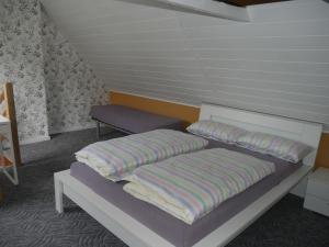 Postel nebo postele na pokoji v ubytování The Ranch - Ferienhaus Drevenack