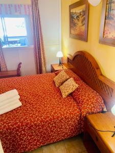 Giường trong phòng chung tại Malagueta beach +15 ảnh