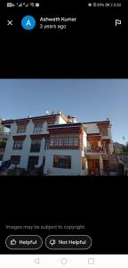 a screenshot of a webpage of a building at Gangs-Shun Homestay in Leh