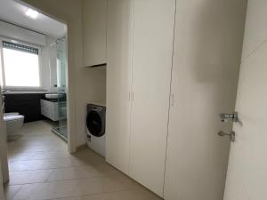 Vannituba majutusasutuses Santa d'aMare appartamento con terrazzo e box auto privato +11 fotot