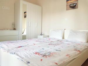 Postel nebo postele na pokoji v ubytování Mango apartment