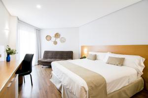 Cama ou camas em um quarto em Cullera Holiday