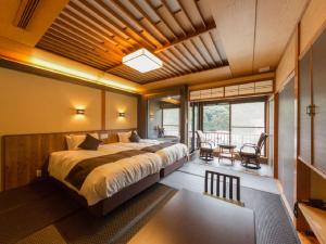 Postel nebo postele na pokoji v ubytování LiVEMAX RESORT Kawaji + 37 fotografií