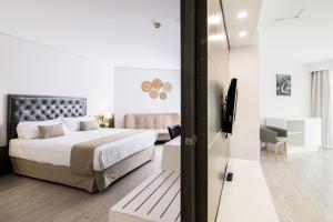 Cama ou camas em um quarto em Cullera Holiday