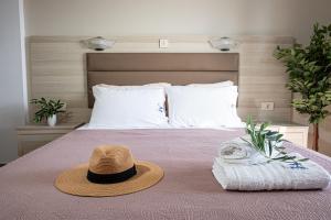 Posteľ alebo postele v izbe v ubytovaní Maria Resort Parga