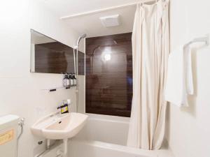 Koupelna v ubytování LiVEMAX RESORT Aki Miyahama Onsen