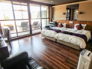 Posezení v ubytování LiVEMAX RESORT Aki Miyahama Onsen