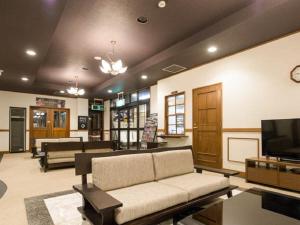 TV a/nebo společenská místnost v ubytování LiVEMAX RESORT Aki Miyahama Onsen