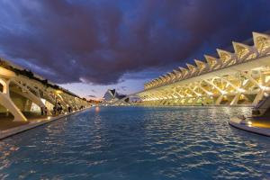 a bridge over the water with the sydney opera house in the background at Cullera Panoramic Sea Views Apartment in Cullera