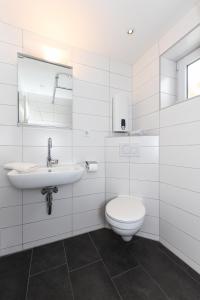 Koupelna v ubytování Haus Nordseepferdchen