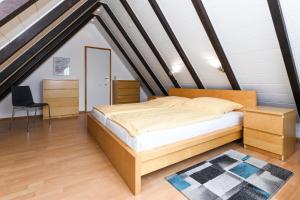 Säng eller sängar i ett rum på Haus Nordseepferdchen