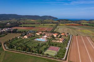 an aerial view of a house and a field at Poggio all'Agnello Sport & Family Holidays in Populonia