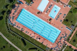 an overhead view of a large swimming pool at Poggio all'Agnello Sport & Active Holidays in Populonia