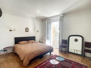 Łóżko lub łóżka w pokoju w obiekcie Magnifique Riad avec patio extérieur