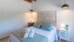 Postel nebo postele na pokoji v ubytování Casita de Jero Coín by Ruralidays + 20 fotografií