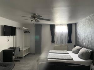 Llit o llits en una habitació de Mikroapartments Klarenthal