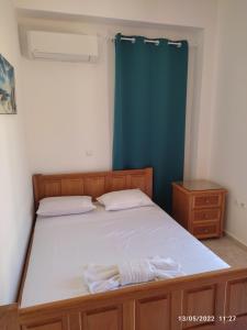 A bed or beds in a room at Villa Cassandra