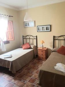 Posteľ alebo postele v izbe v ubytovaní Villa Capricho Nerja
