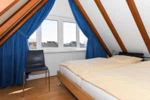 Postel nebo postele na pokoji v ubytování Hus achtern Diek