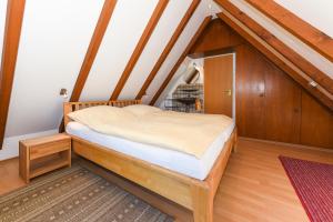 Postel nebo postele na pokoji v ubytování Hus achtern Diek