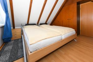 Postel nebo postele na pokoji v ubytování Hus achtern Diek