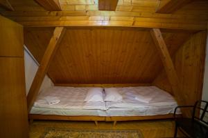 Postel nebo postele na pokoji v ubytování Agroturystyka Na Dzielnicach