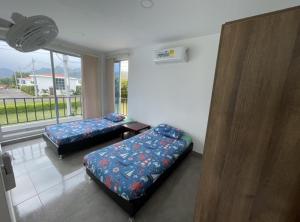 Postel nebo postele na pokoji v ubytování Zion House