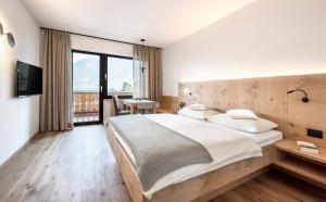 Postel nebo postele na pokoji v ubytování Pension Appartment Hecherhof