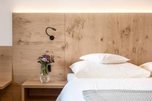 Postel nebo postele na pokoji v ubytování Pension Appartment Hecherhof