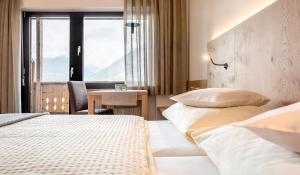Postel nebo postele na pokoji v ubytování Pension Appartment Hecherhof