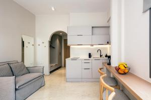 A kitchen or kitchenette at Ariadne Suites