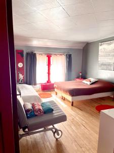Krevet ili kreveti u jedinici u okviru objekta Maison de 2 chambres avec jardin clos et wifi a La Croix sur Ourcq